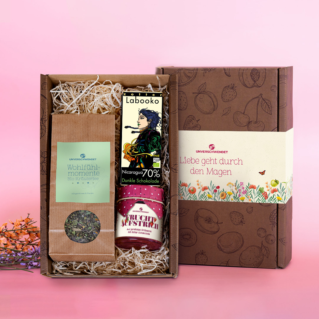 Geschenkset mit Kräutertee, Schokolade und Feinkost-Gläschen (Vorderansicht) Geschenkset mit Kräutertee, Schokolade und Feinkost-Gläschen