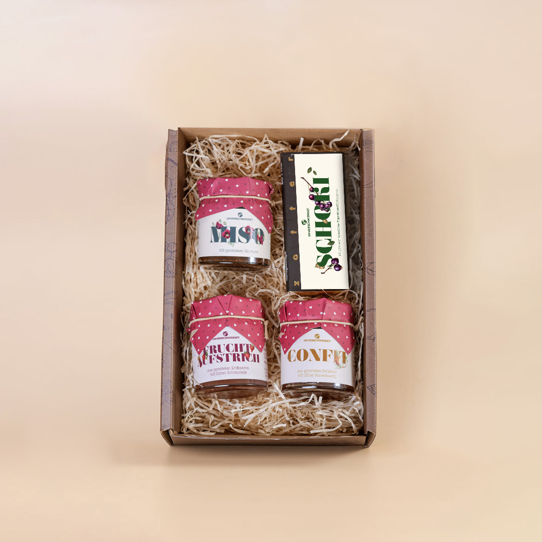 Geschenkset mit Feinkost-Gläschen und Schokolade (Vorderansicht) Geschenkset mit Feinkost-Gläschen und Schokolade